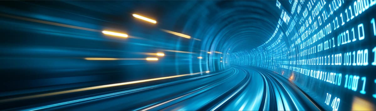 Blue digital tunnel with binary code and motion blur lights representing high-speed data transfer and technology